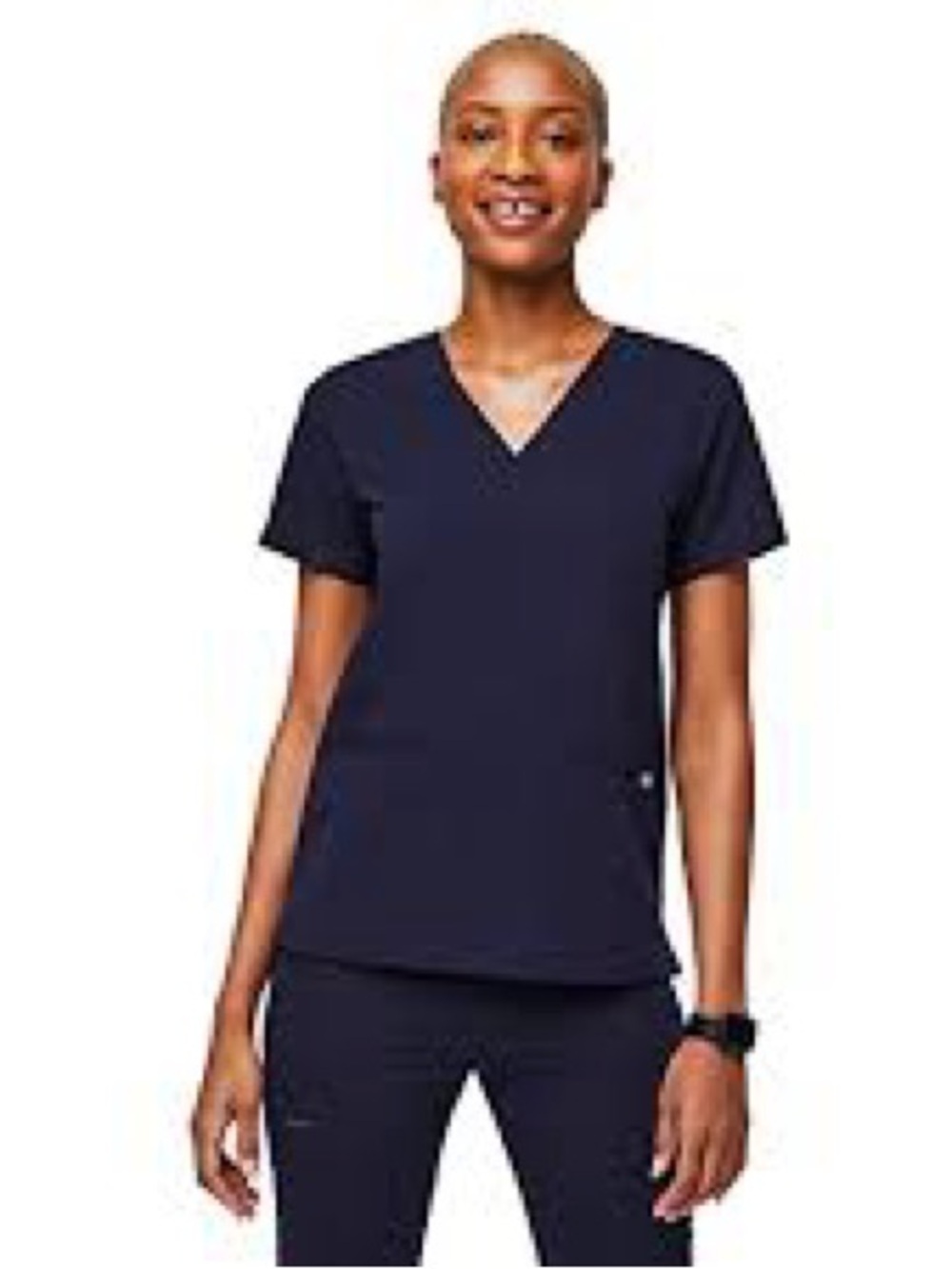 FIGS Casma Three-Pocket Scrub Top in navy blue.